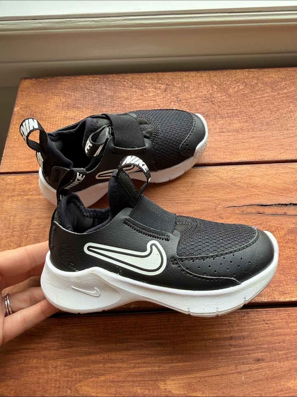 Nike Kids 8 US Black and White Slip-On Sneakers